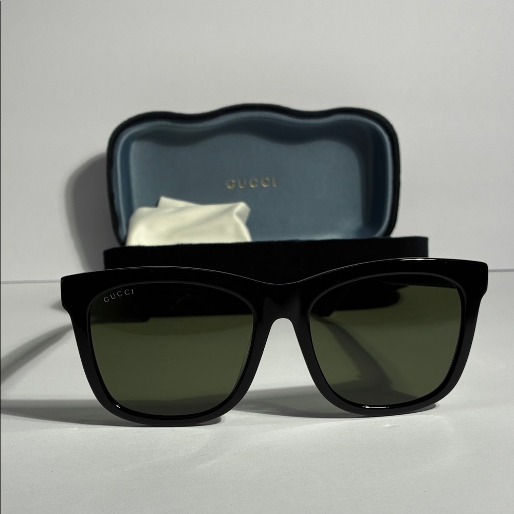 New Authentic GG0057SKN 002 Gucci Black Sunglasses with Green Lenses
